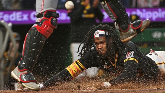 Falter, Pirates beat Reds by only score possible taken on the North Shore (Top story). Photo by JUSTIN BERL / GETTY